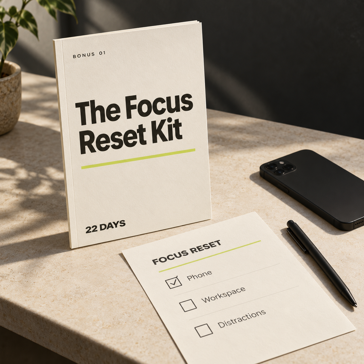 The Focus Reset Kit ivory guide with a phone set aside and a checklist for phone, workspace, and distractions.